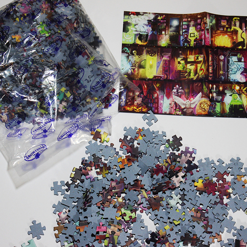 See what's inside the box: artwork poster and puzzle pieces in a bag